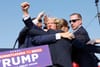 Trump is rushed offstage after being shot at in Butler, Pennsylvania. (Photo by Anna Moneymaker/Getty Images)