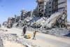 KHAN YUNIS, GAZA - AUGUST 12: Palestinians flee to safer areas with their belongings. (Photo by Ashraf Amra/Getty Images)