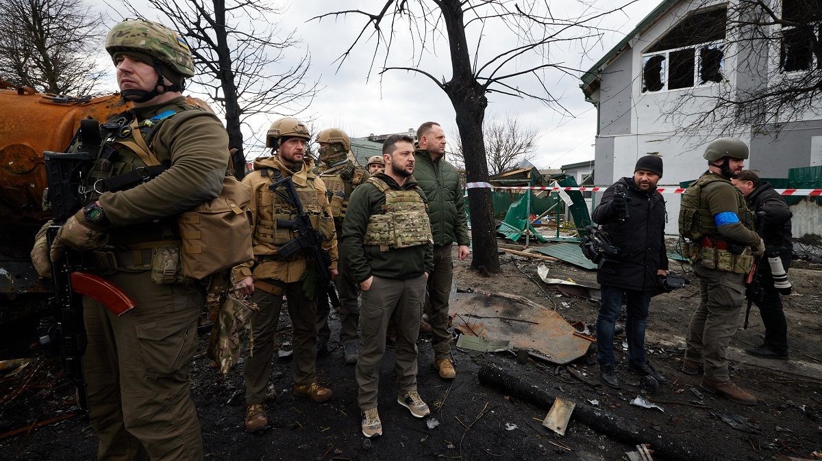 Ukraine's President Volodymyr Zelensky tours an area that was bombed during the war in Ukraine. Image: Raw Pixel