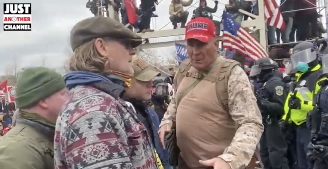 Ray Epps (red hat) on the front lines of the Jan. 6 riots. Screenshot: Just Another Channel / Rumble