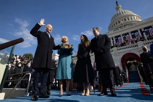 Hunter Biden (right) stands by as his father Joe Biden is sworn in as president. Image: Rawpixel