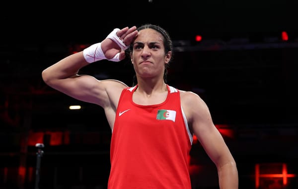 Imane Khelif of Team Algeria celebrates her quarterfinal victory. (Photo by Richard Pelham/Getty Images)